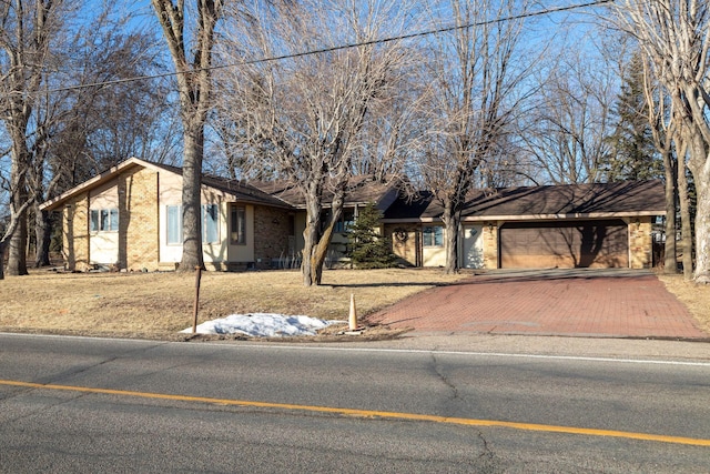 single story home with a garage