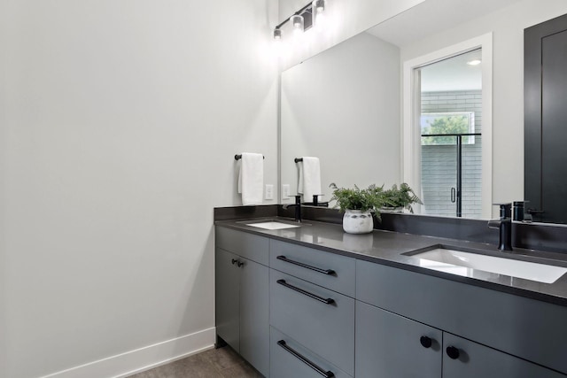 bathroom featuring vanity and hardwood / wood-style flooring