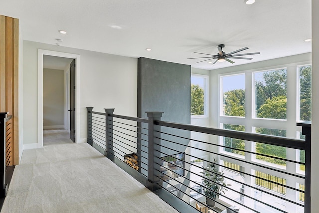 9533 Otchipwe Ave N, Stillwater, MN 55082 - hall with carpet floors, baseboards, recessed lighting, and an upstairs landing