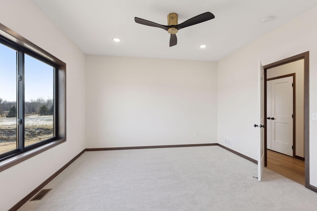21933 Edison Ct, East Bethel, MN 55011 - unfurnished room featuring ceiling fan and light carpet