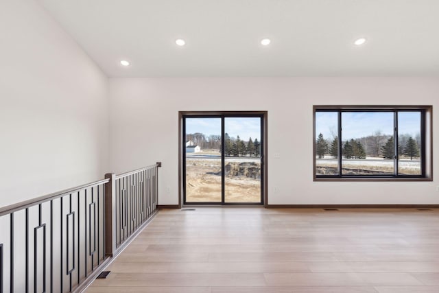 21933 Edison Ct, East Bethel, MN 55011 - empty room featuring light hardwood / wood-style flooring