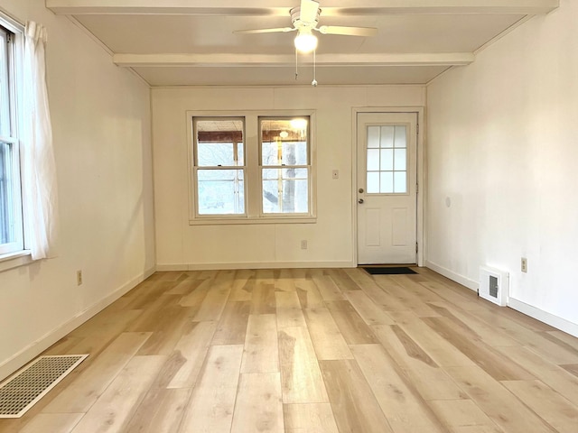 interior space featuring beamed ceiling, ceiling fan, and light hardwood / wood-style floors