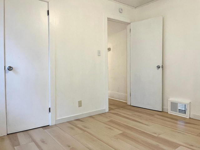 unfurnished bedroom featuring light hardwood / wood-style floors