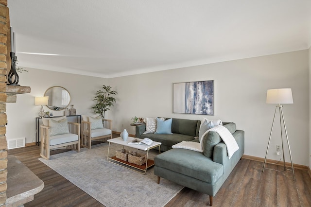 living room with dark hardwood / wood-style floors