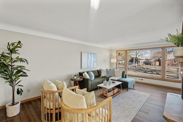 living room with dark hardwood / wood-style floors