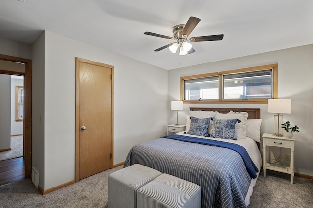 bedroom with ceiling fan and carpet flooring