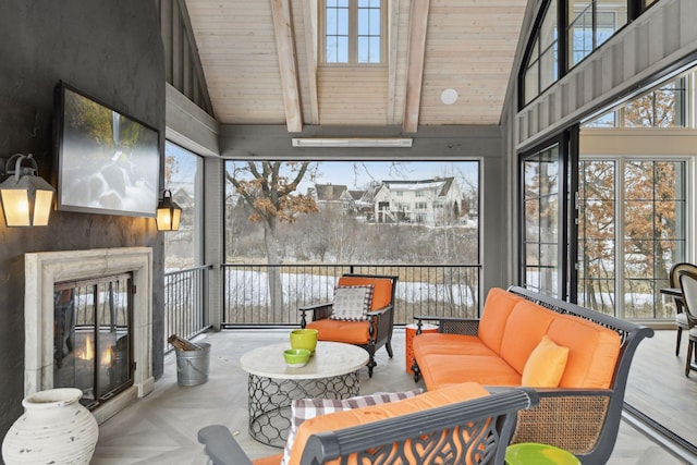 sunroom / solarium with vaulted ceiling with beams and wood ceiling