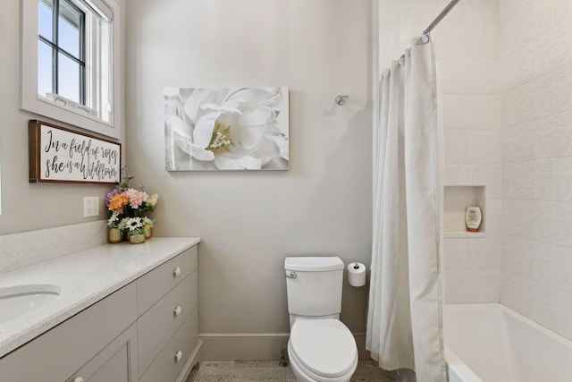 full bathroom featuring vanity, toilet, and shower / bath combo