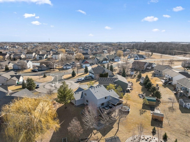 birds eye view of property with a residential view