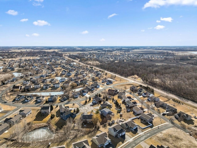birds eye view of property with a residential view