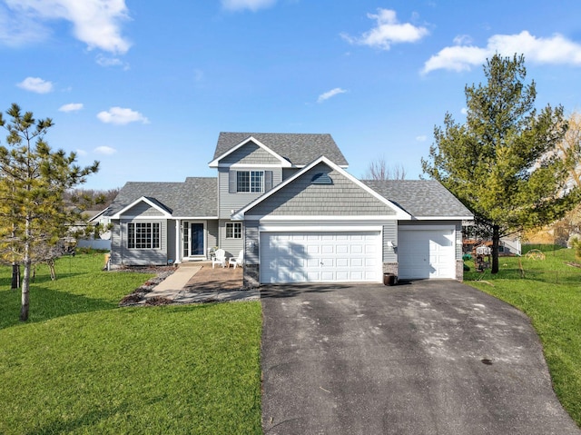 craftsman house with an attached garage, a shingled roof, a front lawn, and aphalt driveway
