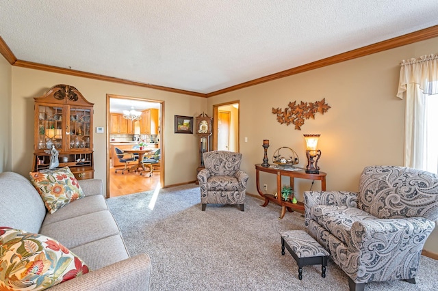 carpeted living room featuring ornamental molding and a textured ceiling