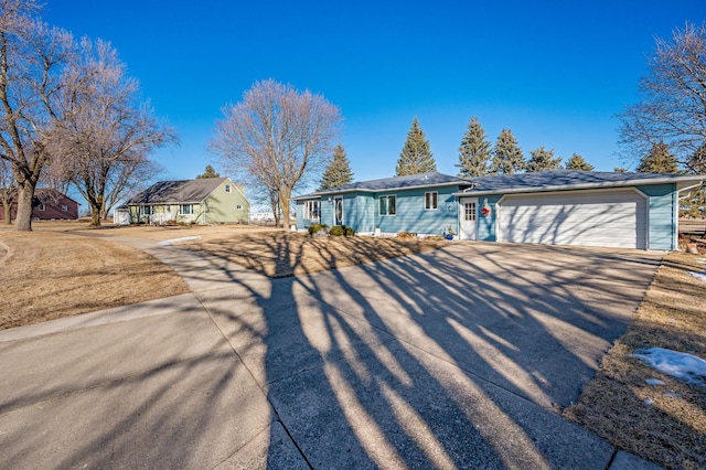 single story home with a garage