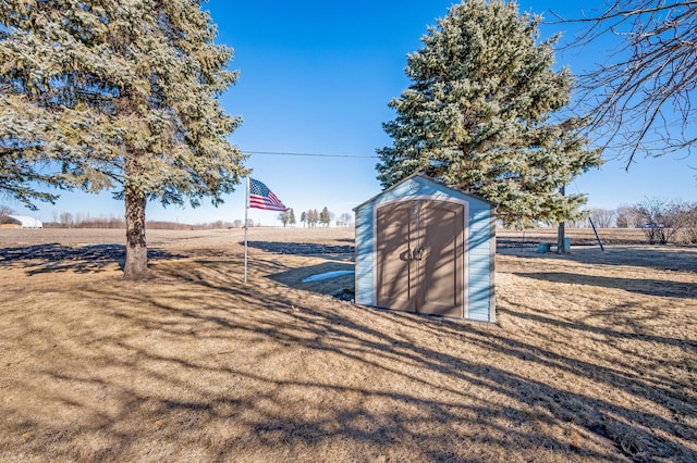 view of outbuilding with a lawn