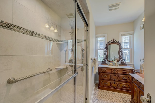 5524 Columbus Ave, Minneapolis, MN 55417 - bathroom featuring vanity, a stall shower, and tile patterned floors