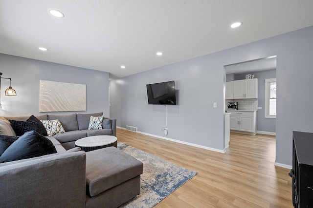 living room featuring light hardwood / wood-style floors