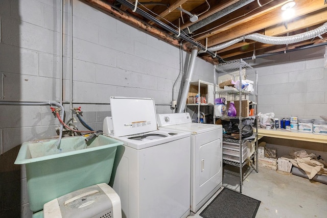 laundry room with washing machine and dryer