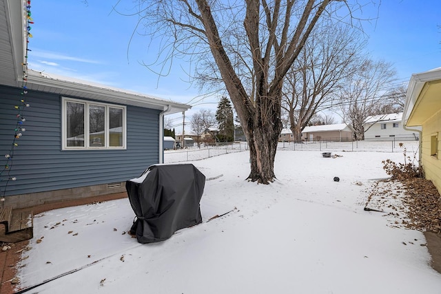 view of yard covered in snow