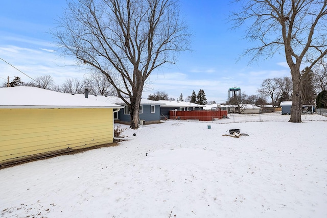 view of yard covered in snow