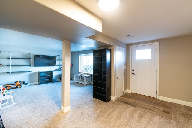 foyer with carpet