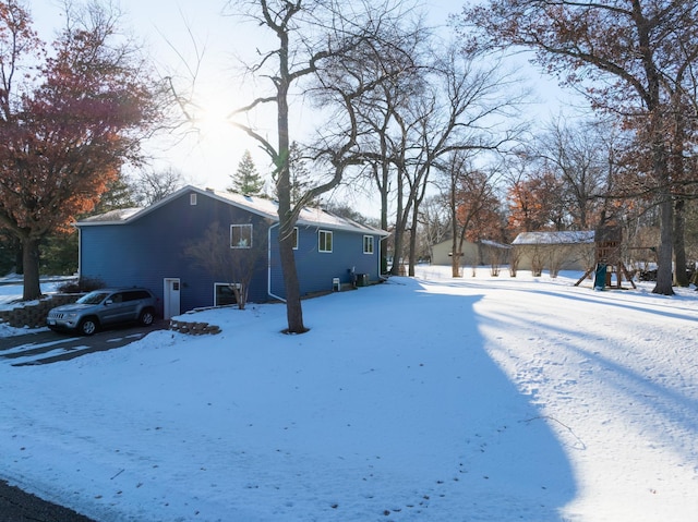 view of yard covered in snow