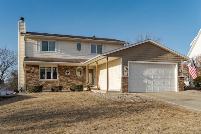 view of property featuring a garage and a front lawn