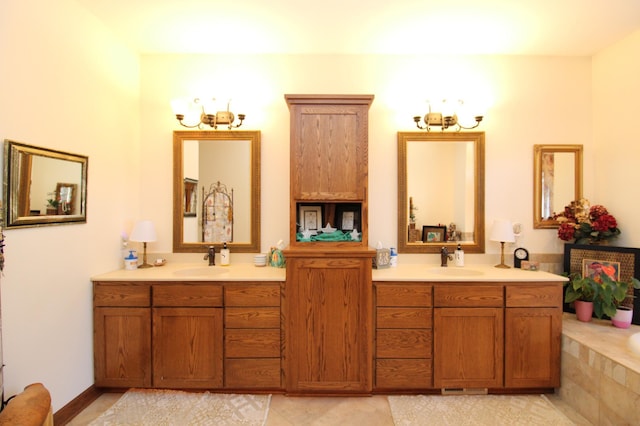 bathroom with vanity and tiled bath