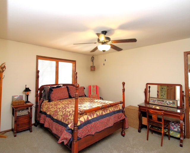 bedroom with ceiling fan and carpet floors