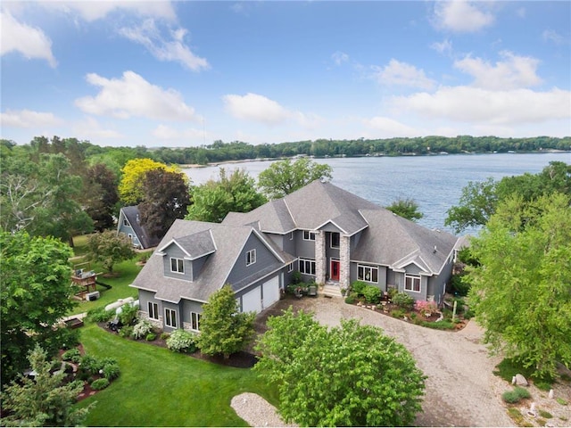 drone / aerial view with a water view