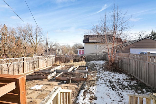 view of yard layered in snow