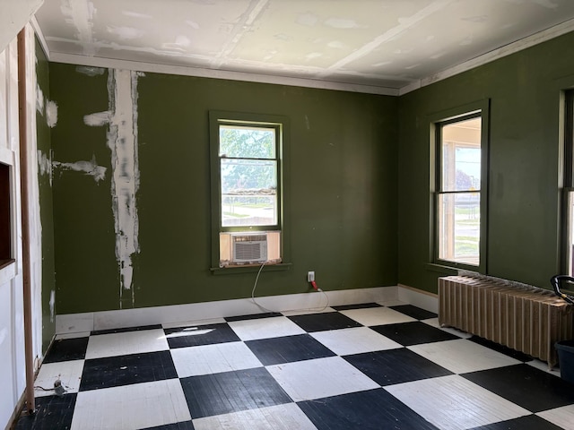 20 1st Ave NW, Plainview, MN 55964 - unfurnished room with radiator heating unit, tile patterned floors, and cooling unit