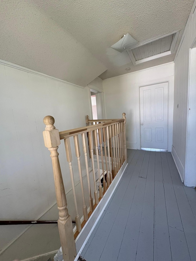 20 1st Ave NW, Plainview, MN 55964 - corridor featuring an upstairs landing, a textured ceiling, and hardwood / wood-style floors