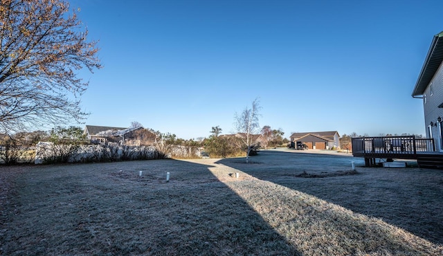 view of yard featuring a deck