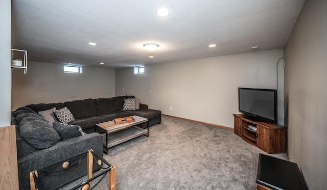 carpeted living room with a textured ceiling