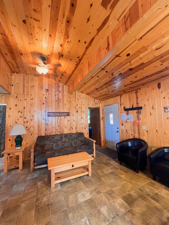 tiled living room with wooden walls and wooden ceiling