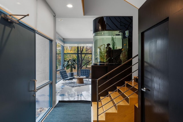 1128 Kenwood Pkwy, Minneapolis, MN 55403 - staircase with recessed lighting and wood finished floors