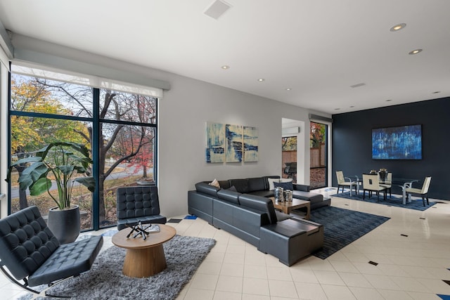 tiled living room with recessed lighting