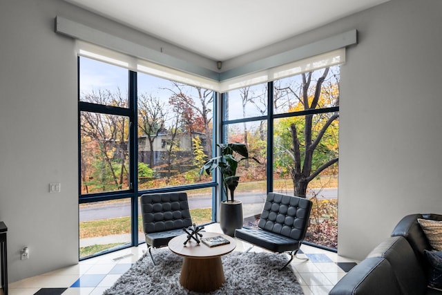 sunroom with a wealth of natural light and visible vents