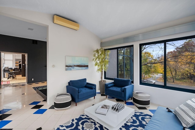 interior space featuring vaulted ceiling, a wall mounted AC, and tile patterned flooring