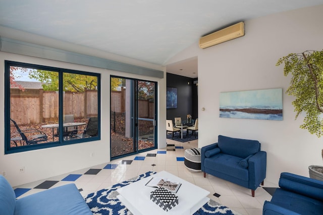 interior space with lofted ceiling and a wall mounted AC