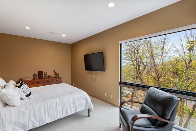 bedroom with carpet floors, recessed lighting, and baseboards