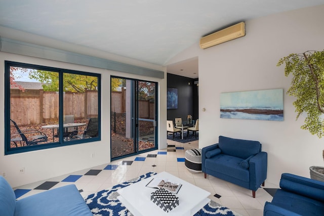 1128 Kenwood Pkwy, Minneapolis, MN 55403 - living area with tile patterned flooring, a wall mounted air conditioner, and lofted ceiling