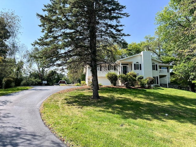 exterior space with a yard