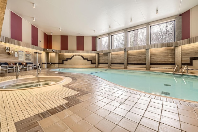 view of swimming pool featuring an indoor in ground hot tub