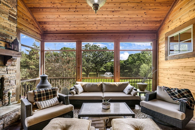 sunroom / solarium with vaulted ceiling and wood ceiling