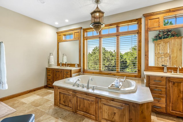 bathroom with vanity and a bathtub