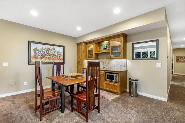 view of carpeted dining room