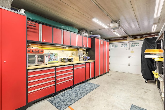 garage featuring a garage door opener