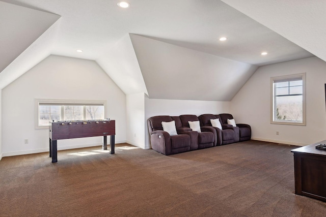 interior space featuring vaulted ceiling and carpet floors