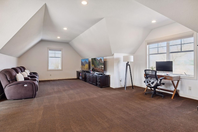 carpeted office with vaulted ceiling